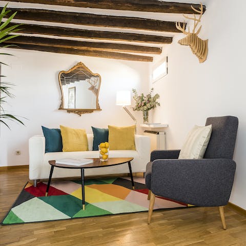 Relax in the stylish beamed living area, a glass of Spanish wine in hand