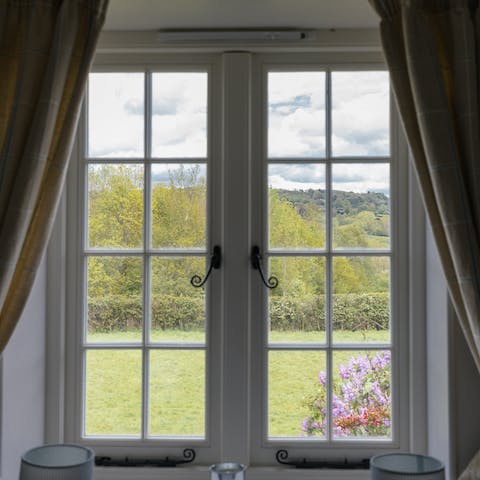 Gaze out over miles of orchards and unspoiled rolling countryside from the attic bedroom window