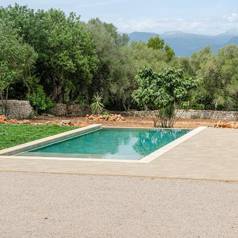 Cool off in the communal swimming pool and admire the rural views