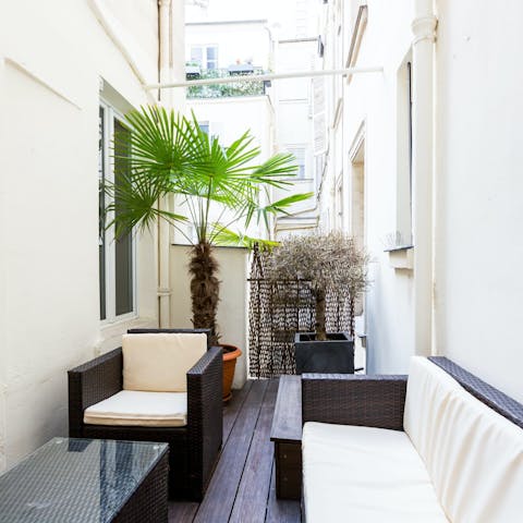 Enjoy a glass of French wine on the small terrace