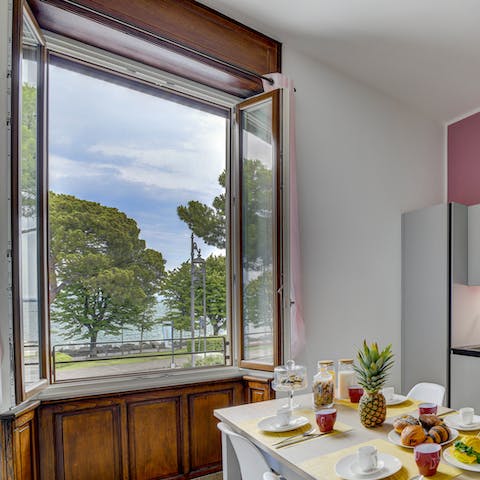 Pull up a chair beside the large window and savour your morning coffee while glimpsing of the lake