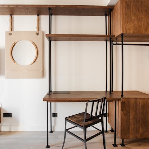 Catch up on emails from your room's sleek workspace