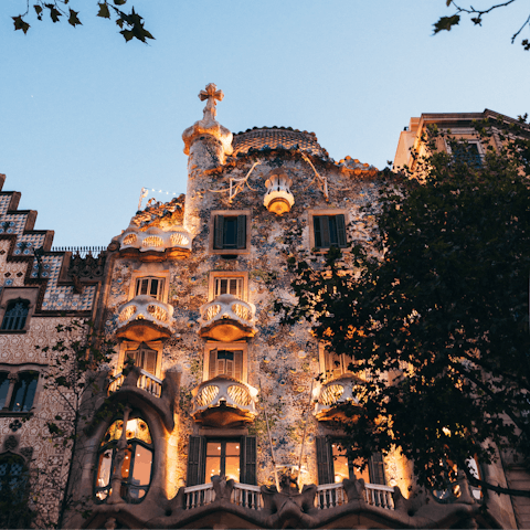 Visit Gaudi's majestic and iconic Casa Batlló, a short walk away