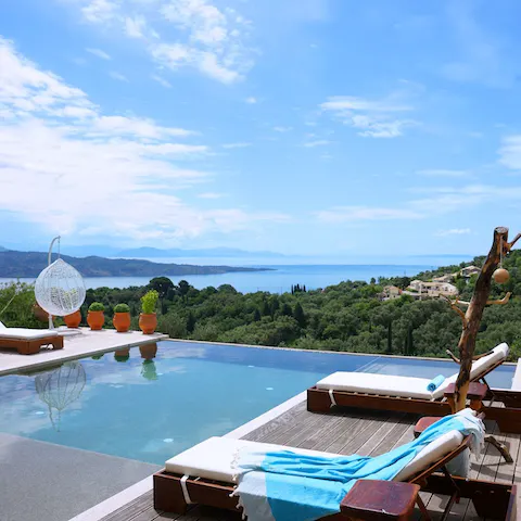 Spend blissful days relaxing by the pool, marvelling at your view of the rolling hills and far-stretching sea