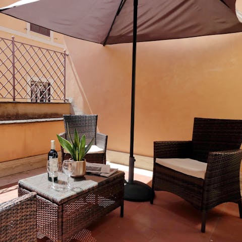 Enjoy a glass of wine on the bedroom terrace before dining out