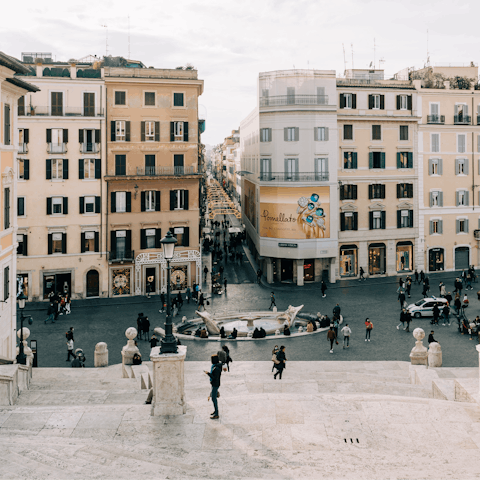 Sip coffee and watch the world go by from Piazza di Spagna – it's a seven-minute walk