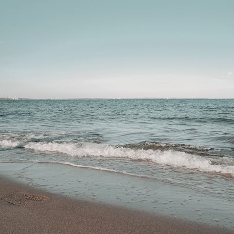 Enjoy the oceans and sands of the beach – a fourteen-minute walk away
