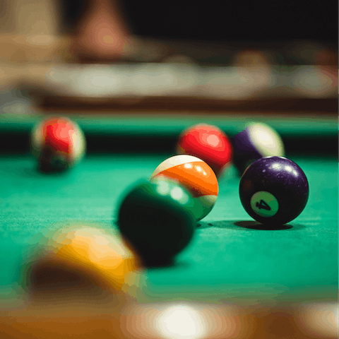 Play a round or two of pool in the communal game room