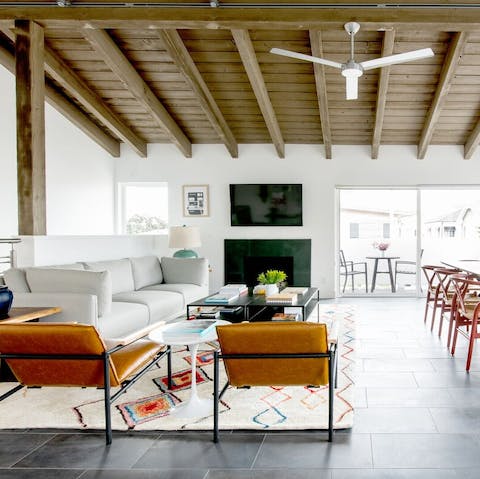 Gather for movie and game nights in the living area