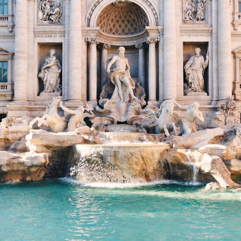 Toss a coin in the Trevi fountain and make a wish