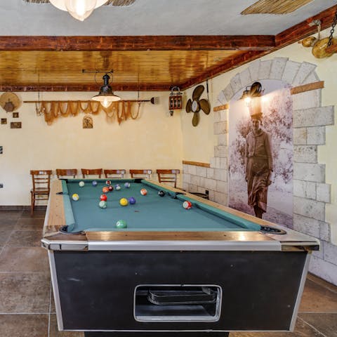 Enjoy a game of pool in the games room for a fun evening with friends and family