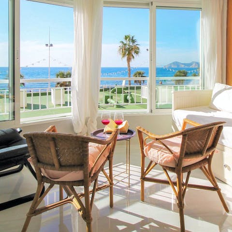 Sit back with a cocktail and admire the sea views