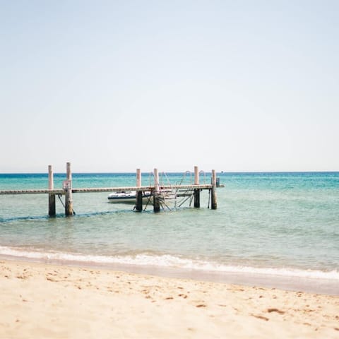 Stroll down to Benidorm's Levante Beach with soft sands and sunbeds