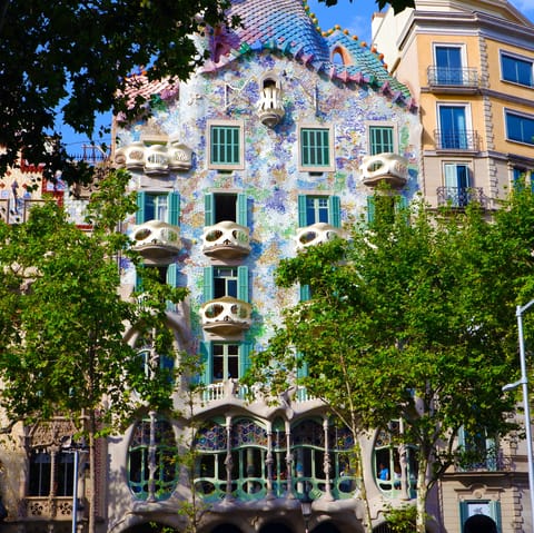 Visit Gaudí's vibrant Casa Batlló, a four-minute walk away