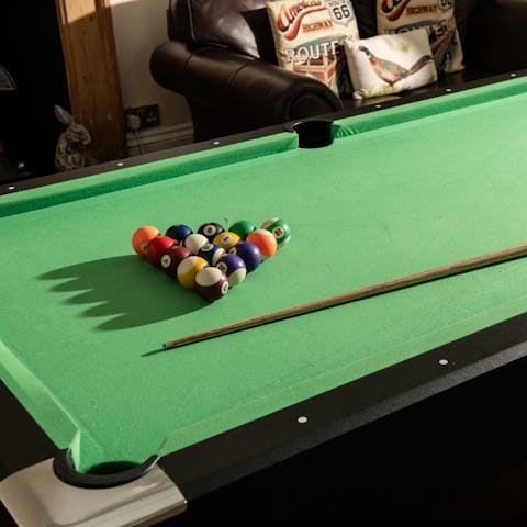 Rack up a game of pool in the games room indoors