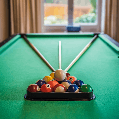 Rack up a game of pool in the games room indoors