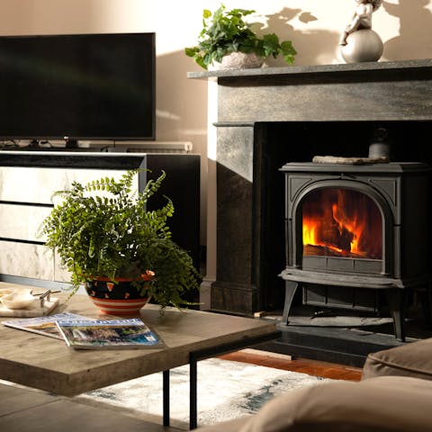 Get cosy in front of the fireplace