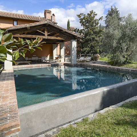 Relax in the shade of the porch, or enjoy cooling dips in the private pool