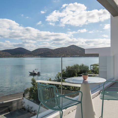 Sit out on the balcony with a view of azure sea and Kalydon's mountains