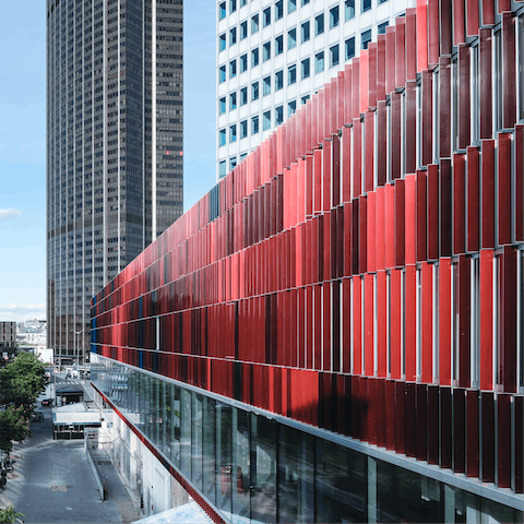 Stroll nine minutes to the Montparnasse Tower to ascend its dizzying heights