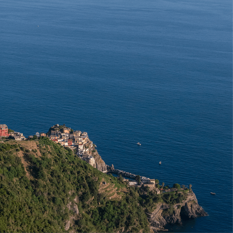 Take a boat trip from the nearby harbour to explore the Cinque Terre National Park