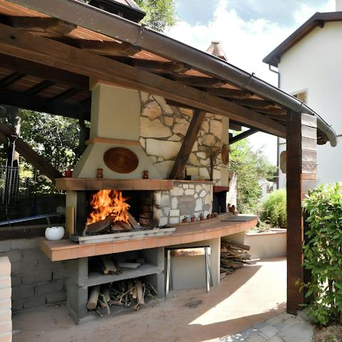 Perfect your alfresco cooking skills at the outdoor pizza oven