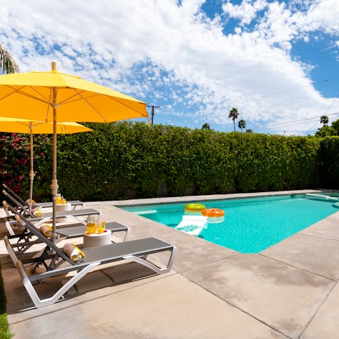 Soak up the sun and take refreshing dips in the swimming pool 