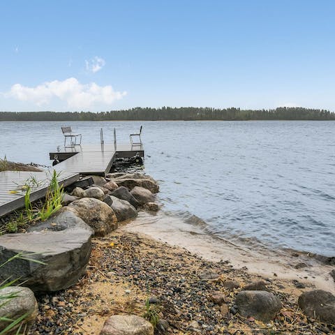 Hire a paddleboard or boat from the host and head out onto Lake Saimaa