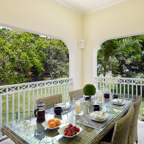 Gather together on the covered dining terrace to tuck into tasty home-cooked meals