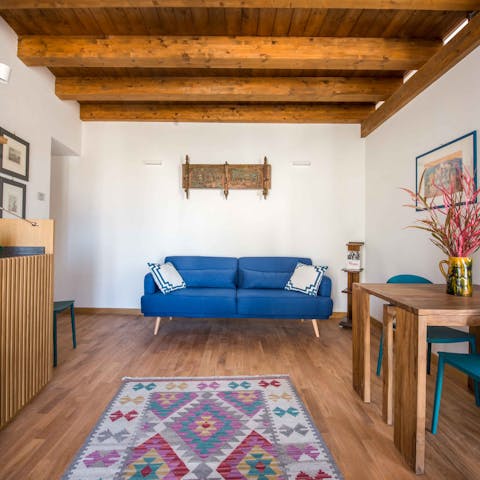 Steal a quiet moment for yourself with a good book in the rustic living space
