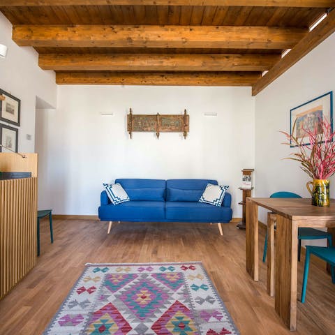 Steal a quiet moment for yourself with a good book in the rustic living space
