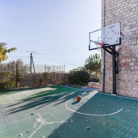 Shoot a few hoops on the private basketball court