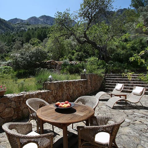 Have a leisurely breakfast on the verdant terrace