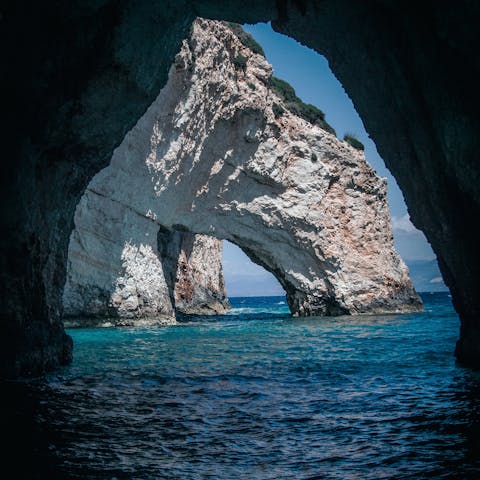Explore the majestic Blue Caves, a short drive away