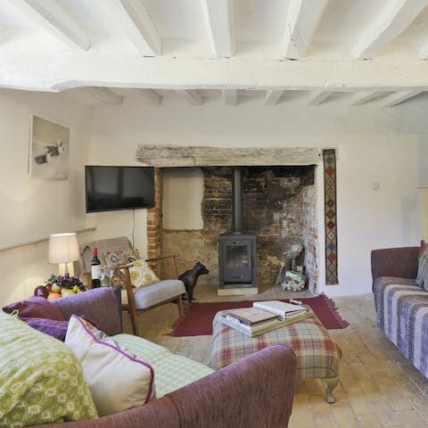 Sink into the plump sofas and enjoy a glass of red wine next to the crackling fire