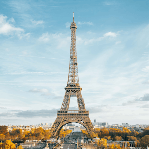 Ascend the iconic Eiffel Tower, a short drive away