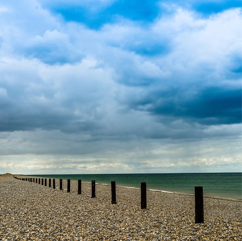 Stroll along Salthouse Beach – within easy driving distance