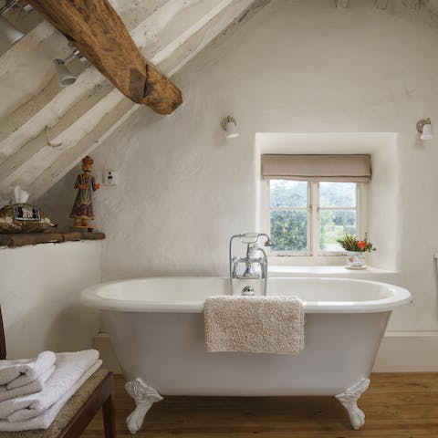 Take your time to relax into the roll top bath after exploring the Cotswolds 