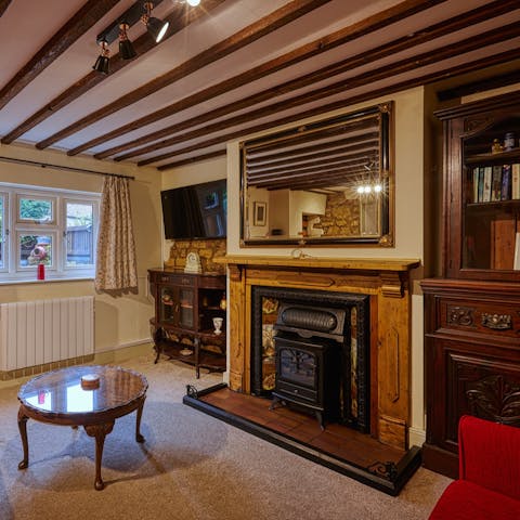 Snuggle up by the fire after a long walk through the village