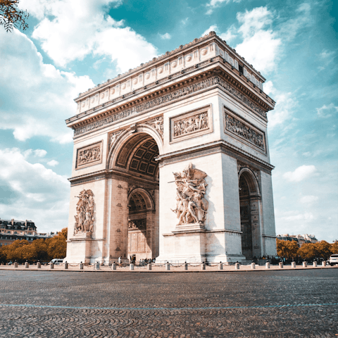 Ride thirty minutes from Bel-Air metro to the Arc de Triomphe