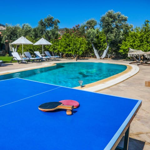 Blow off some steam with a poolside game of table tennis