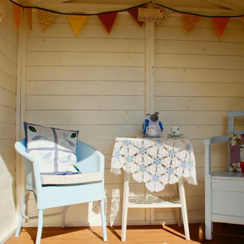 Spend sunny evenings in the garden, unwinding by the summerhouse
