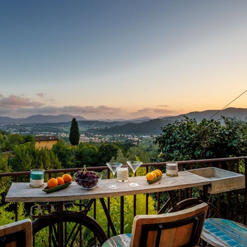 Sip cocktails and drink in the stunning Tuscan views from the terraces