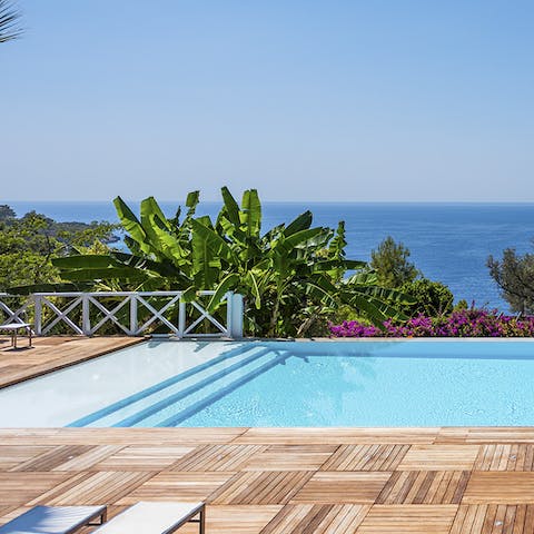 Step into the pool and admire the stunning sea views