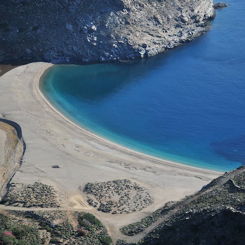 Sink your toes into the sands of Zorkos Beach, a short walk away