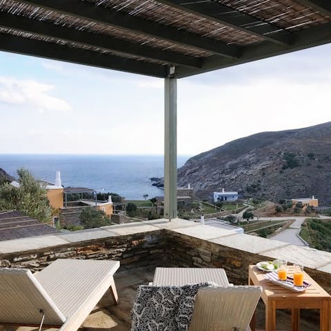 Sip fresh juice from the terrace overlooking the Aegean Sea