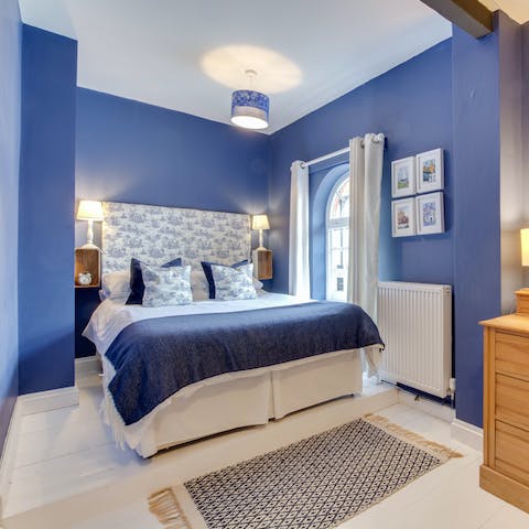 Enjoy the coastal tones of your stylish bedroom