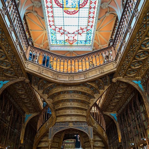 Head to Livraria Lello, one of the world's most beautiful bookstores, under a twenty-minute walk away