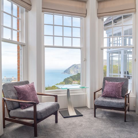 Admire the sea view from one of the large bay windows