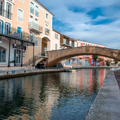 Drive six minutes to Port Grimaud for a walk along the water